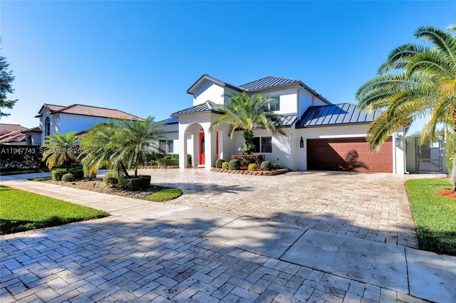 $1,695,000 | 15560 Northwest 83rd Place, Miami Lakes, FL 33016
