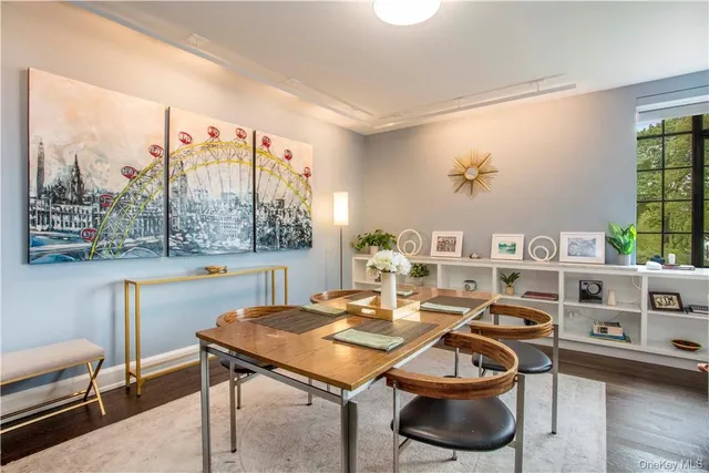 a view of a dining room with furniture window and outside view