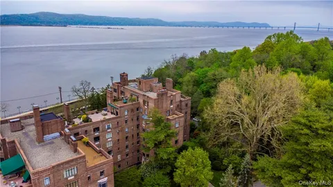 a view of a lake with a building in front of it