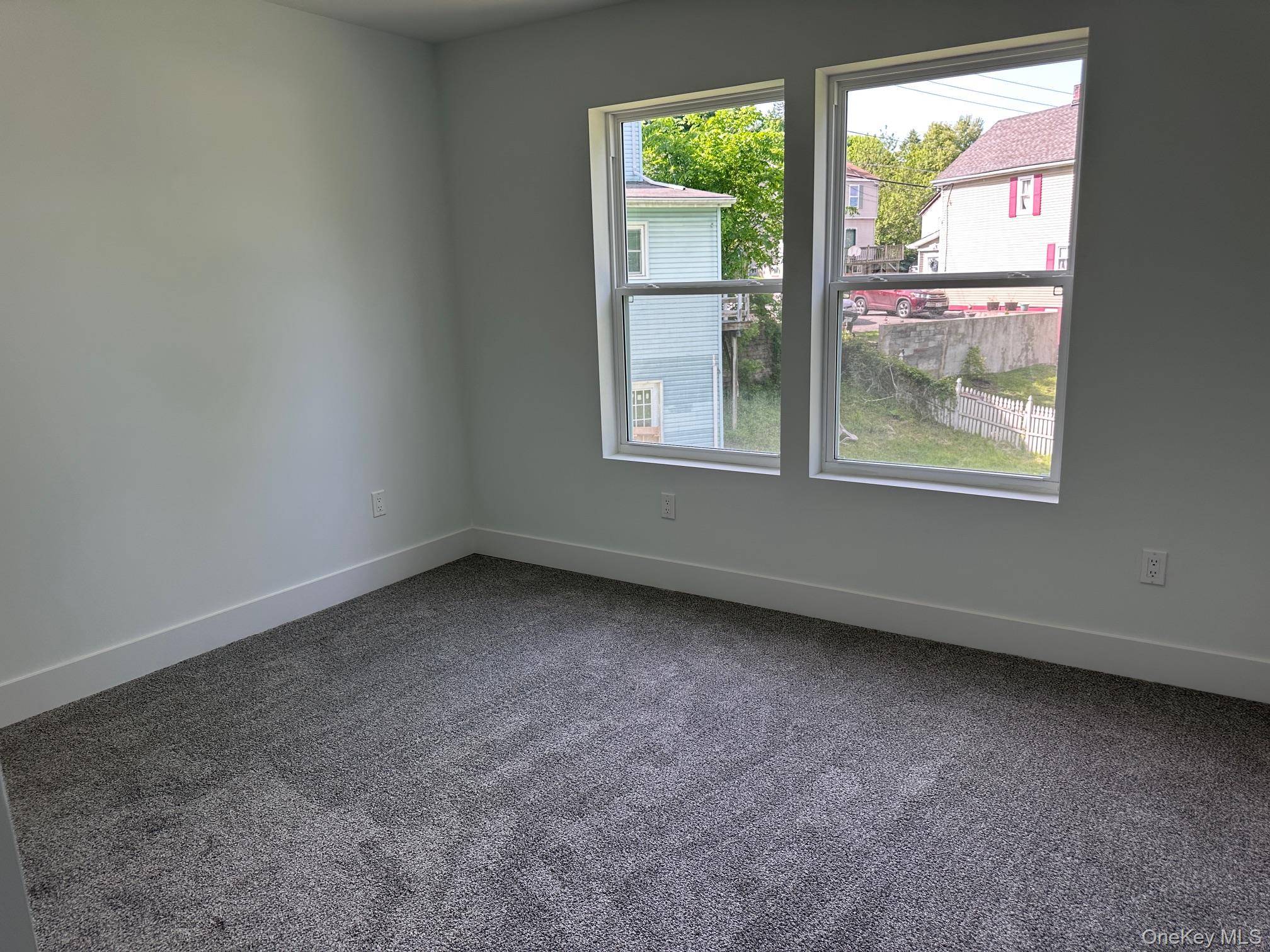 525 Mill Brook Drive Esopus, NY 12466 - Photo 12 of 17 an empty room with windows