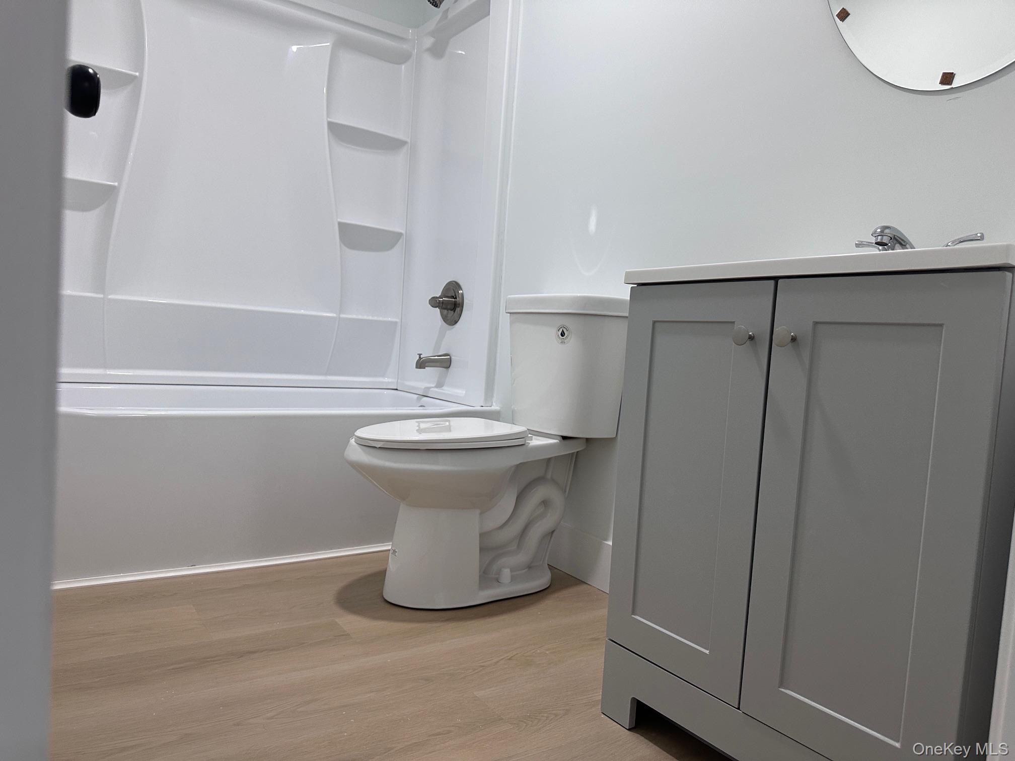 525 Mill Brook Drive Esopus, NY 12466 - Photo 15 of 17 a bathroom with a sink a toilet and shower