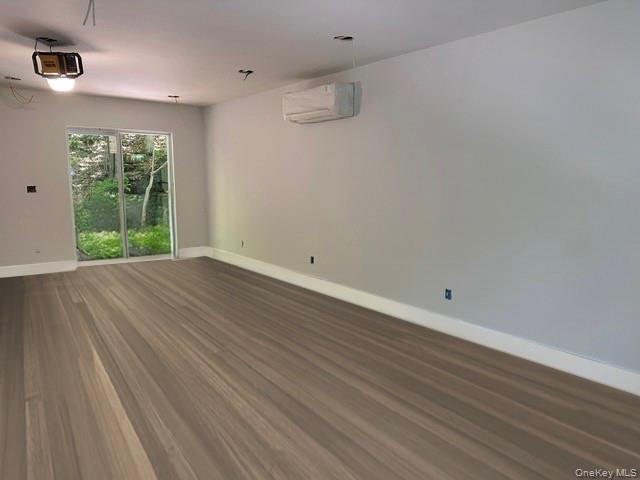 525 Mill Brook Drive Esopus, NY 12466 - Photo 2 of 17 wooden floor in an empty room with a window