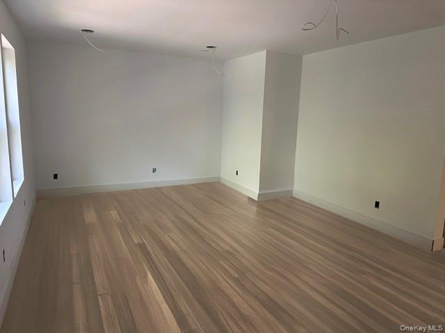 525 Mill Brook Drive Esopus, NY 12466 - Photo 5 of 17 a view of room with wooden floor and window