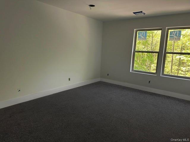 525 Mill Brook Drive Esopus, NY 12466 - Photo 6 of 17 an empty room with a window