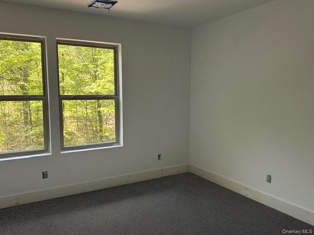 525 Mill Brook Drive Esopus, NY 12466 - Photo 8 of 17 an empty room with a window