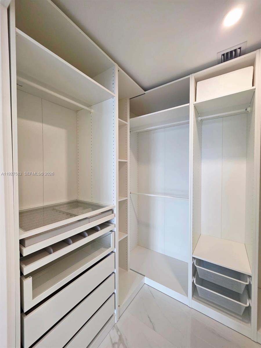 700 Northeast 24th Street, Unit 3803 Miami, FL 33137 - Photo 11 of 22 a view of room with closet