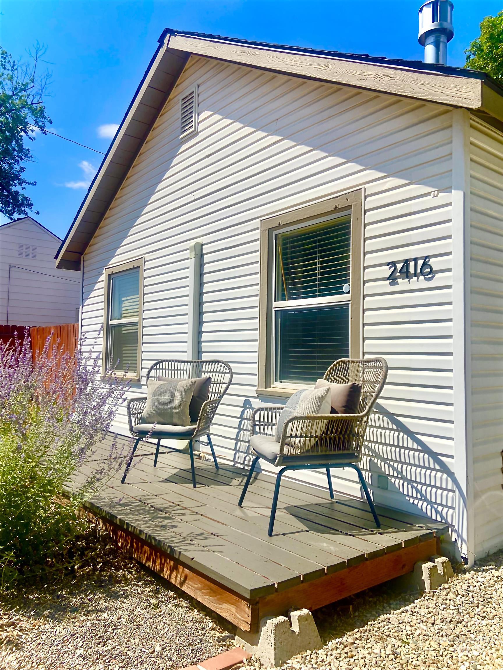 2416 Ona Street Boise, ID 83705 - Photo 3 of 29 View of side of property with a wooden deck