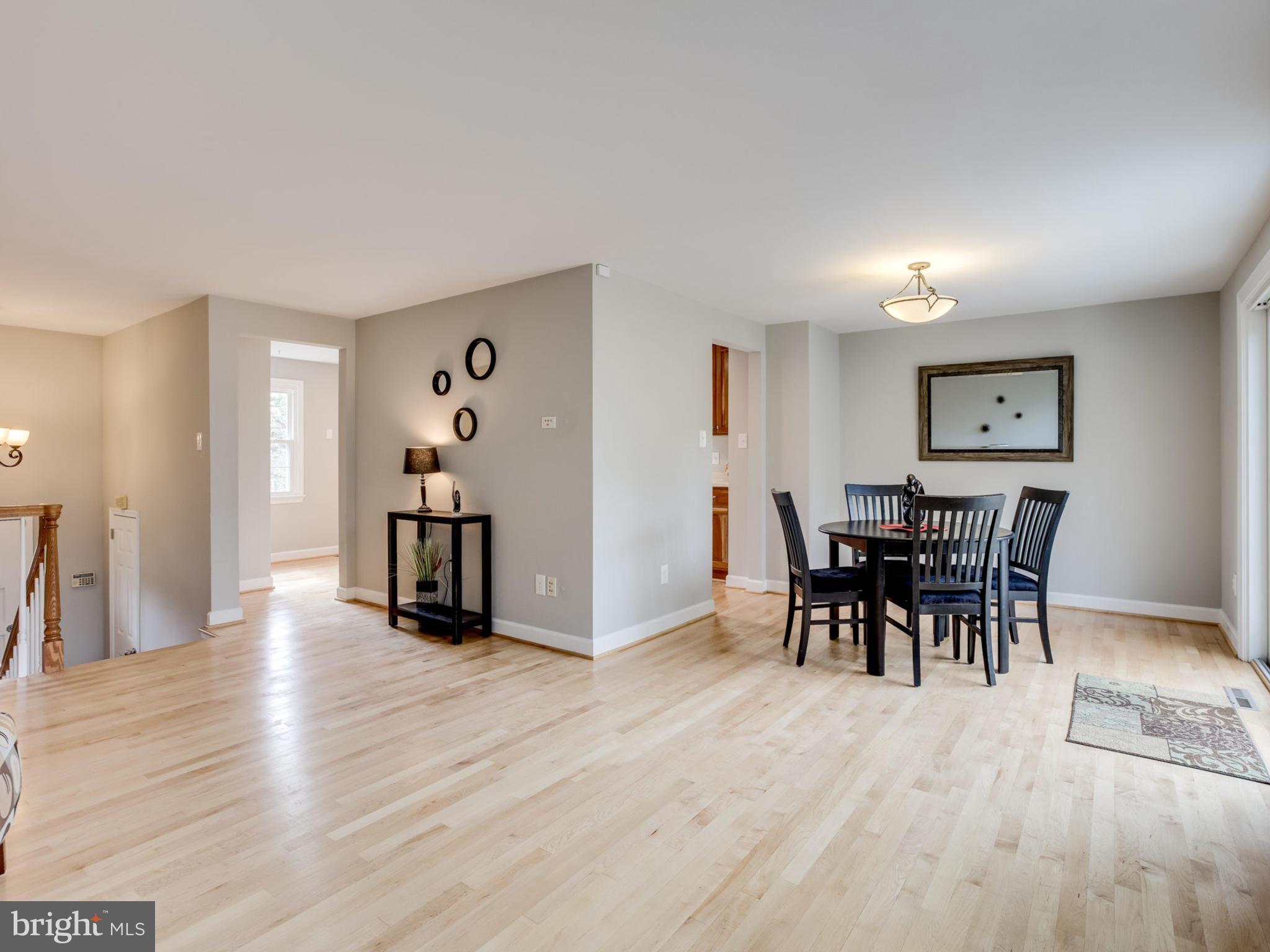 6502 Shipyard Place Falls Church, VA 22043 - Photo 11 of 30 a view of a dining room with furniture and wooden floor