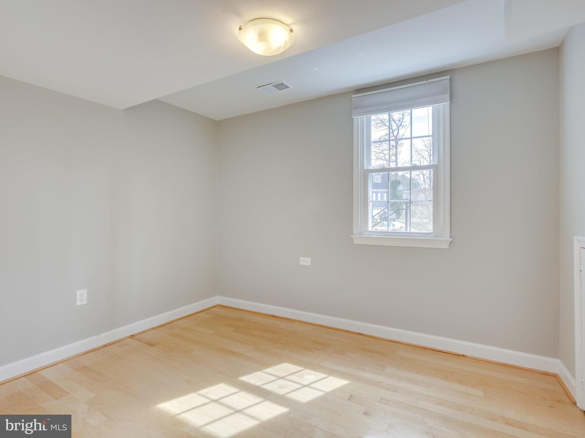 6502 Shipyard Place Falls Church, VA 22043 - Photo 25 of 30 an empty room with a window