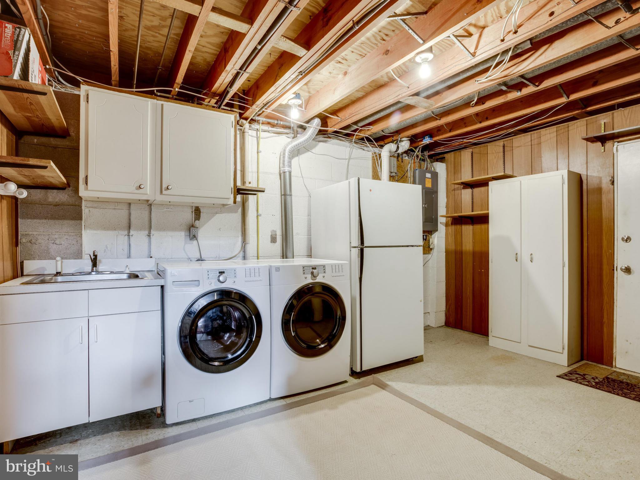 6502 Shipyard Place Falls Church, VA 22043 - Photo 26 of 30 a utility room with dryer and washer