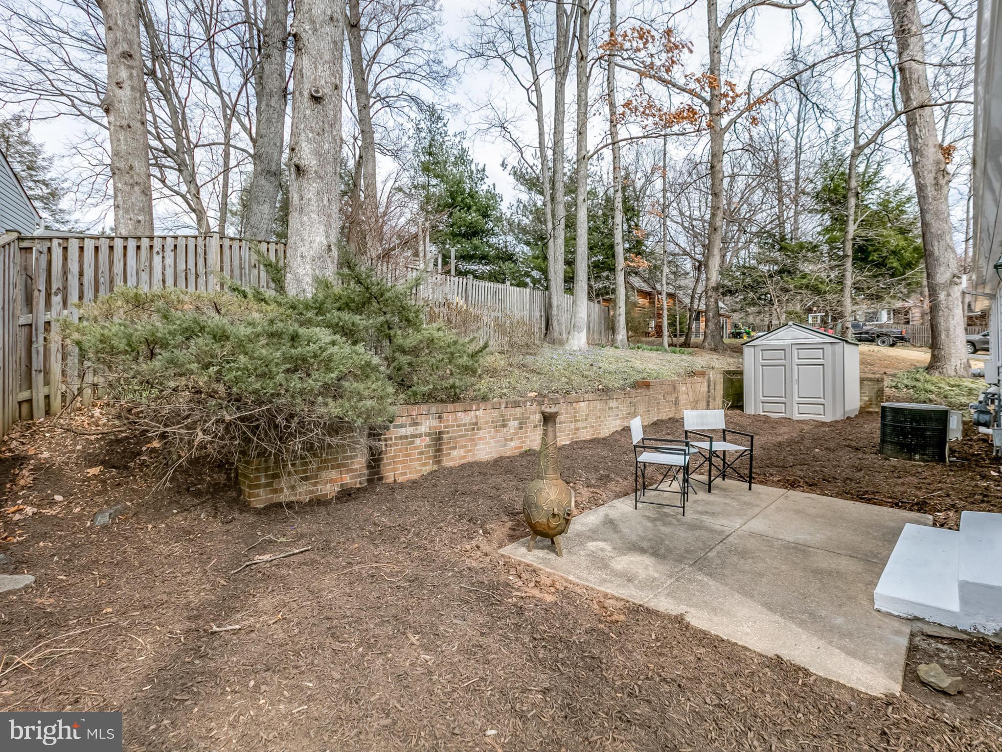 6502 Shipyard Place Falls Church, VA 22043 - Photo 28 of 30 a view of backyard with outdoor seating and green space