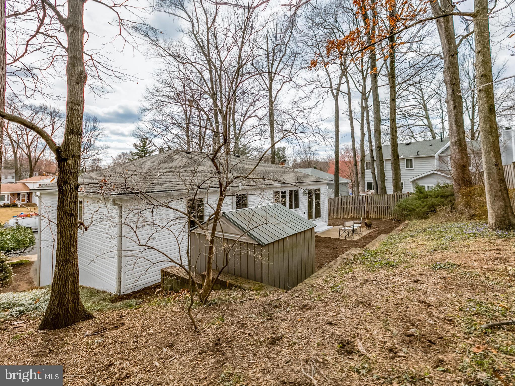 6502 Shipyard Place Falls Church, VA 22043 - Photo 29 of 30 a view of a house with a yard covered in snow