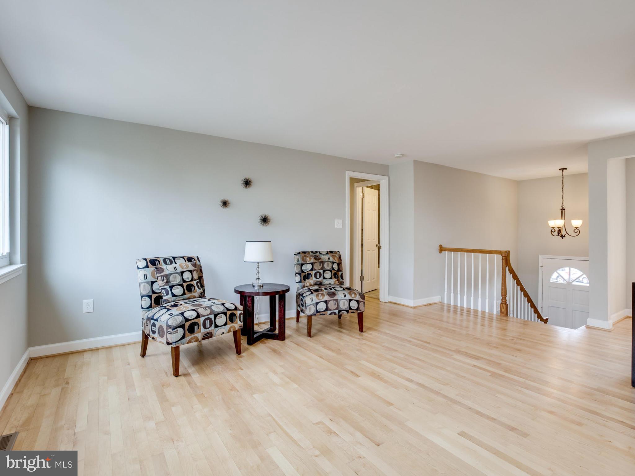 6502 Shipyard Place Falls Church, VA 22043 - Photo 8 of 30 a living room with furniture and wooden floor