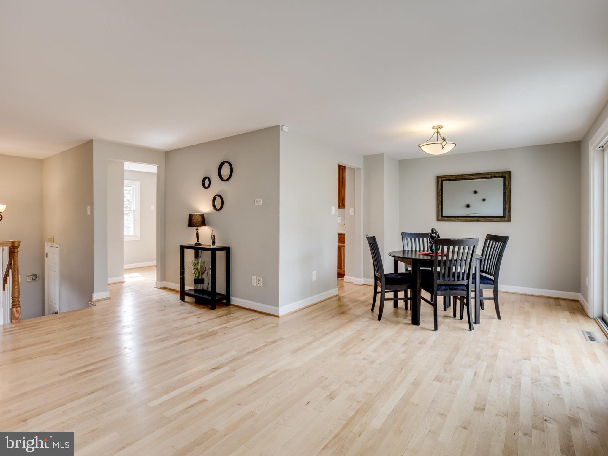 6502 Shipyard Place Falls Church, VA 22043 - Photo 10 of 30 a view of a dining room with furniture and wooden floor