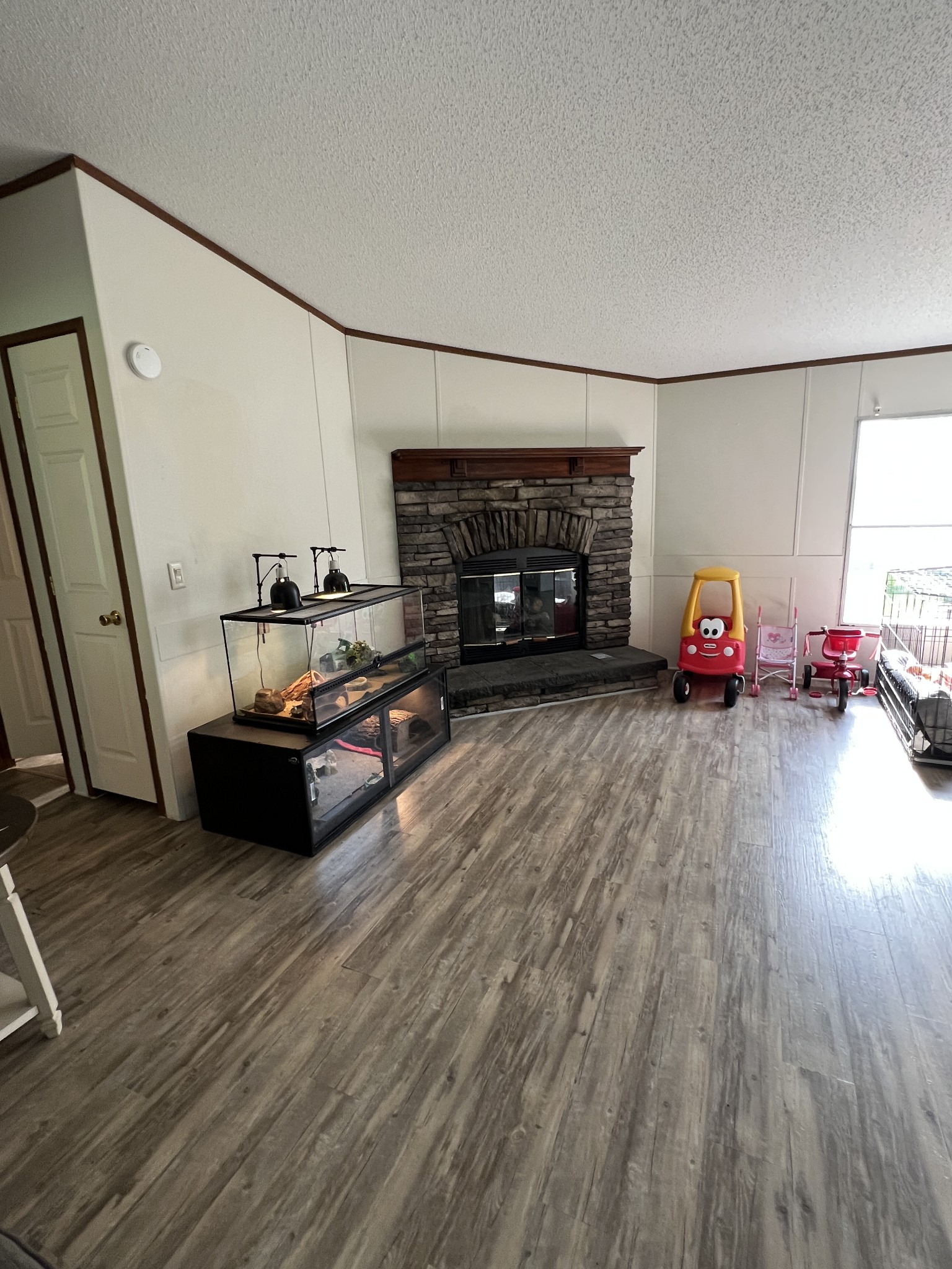 3538 Beasleys Bend Road Lebanon, TN 37087 - Photo 29 of 49 a living room with furniture and a fireplace