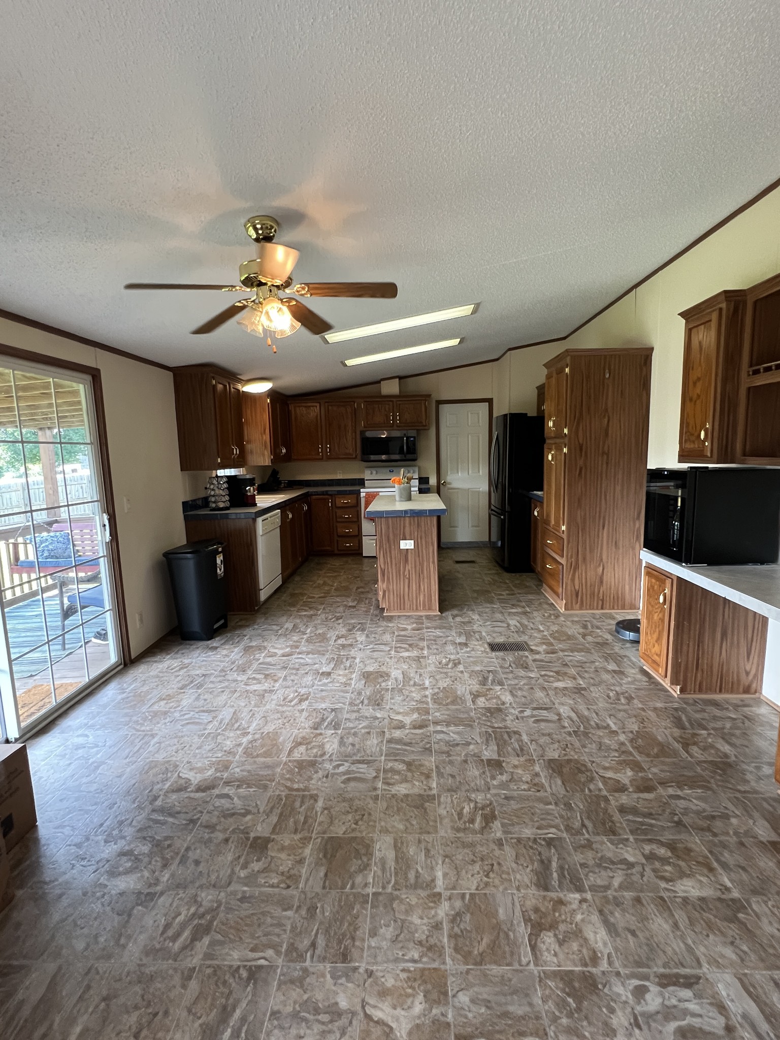 3538 Beasleys Bend Road Lebanon, TN 37087 - Photo 33 of 49 a large kitchen with cabinets and stainless steel appliances
