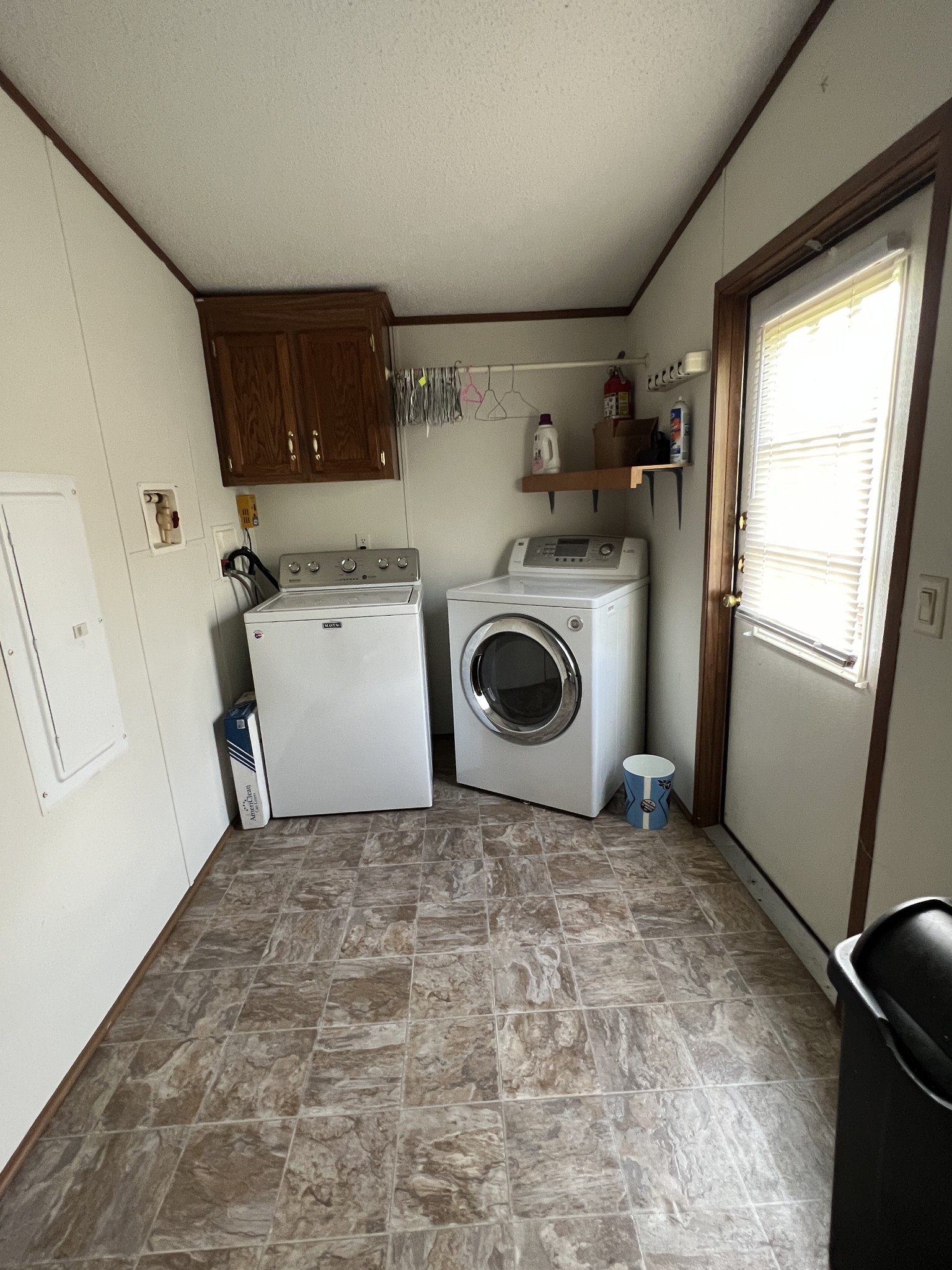 3538 Beasleys Bend Road Lebanon, TN 37087 - Photo 36 of 49 a view of a storage & utility room with a washer dryer