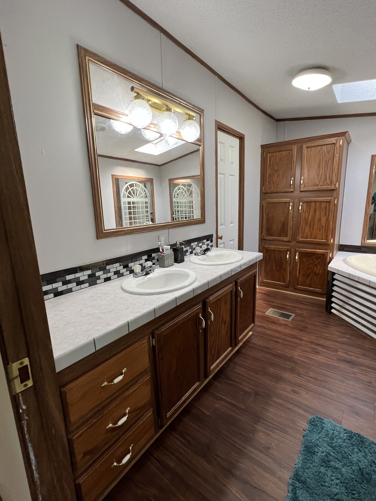 3538 Beasleys Bend Road Lebanon, TN 37087 - Photo 42 of 49 a spacious bathroom with a double vanity sink and a mirror