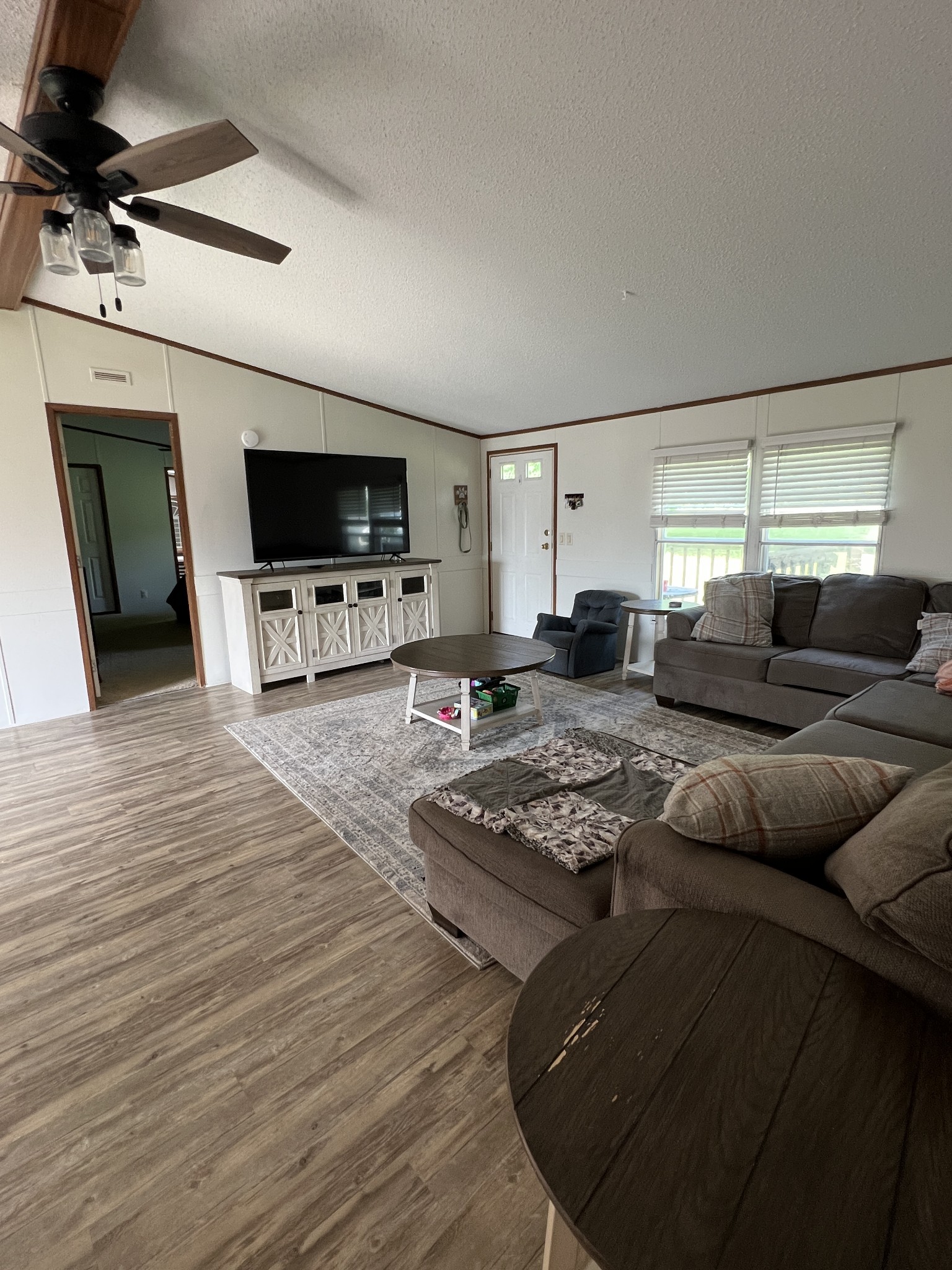 3538 Beasleys Bend Road Lebanon, TN 37087 - Photo 47 of 49 a living room with furniture and a flat screen tv