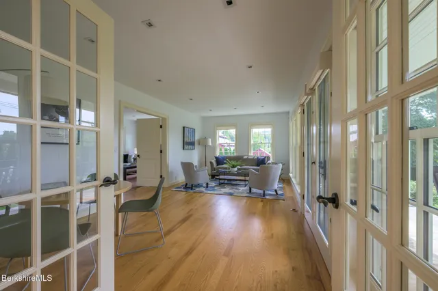 a view of a living room and dining room