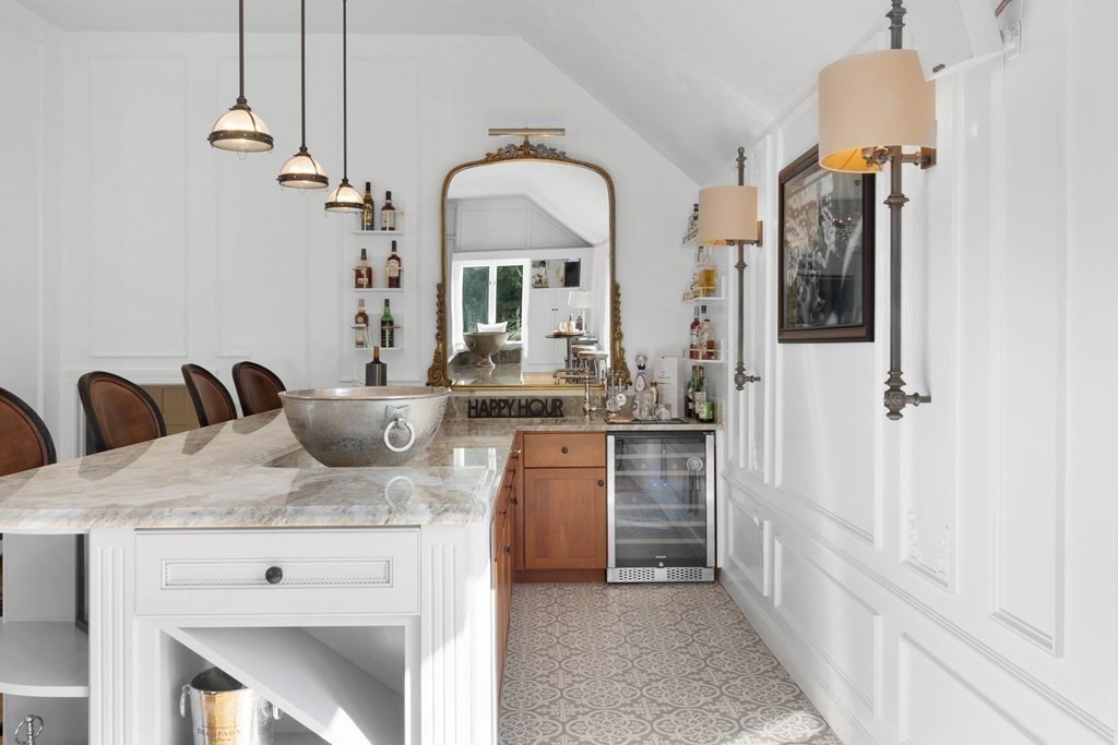 6 David Drive Andover, MA 01810 - Photo 30 of 41 a bathroom with a granite countertop sink and a mirror