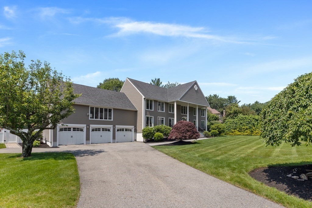 6 David Drive Andover, MA 01810 - Photo 40 of 41 front view of a house with a yard