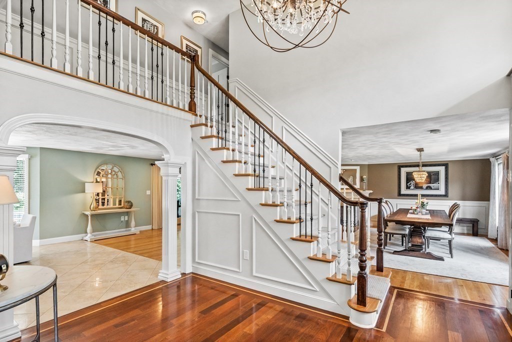 6 David Drive Andover, MA 01810 - Photo 5 of 41 a view of entryway and hall with wooden floor