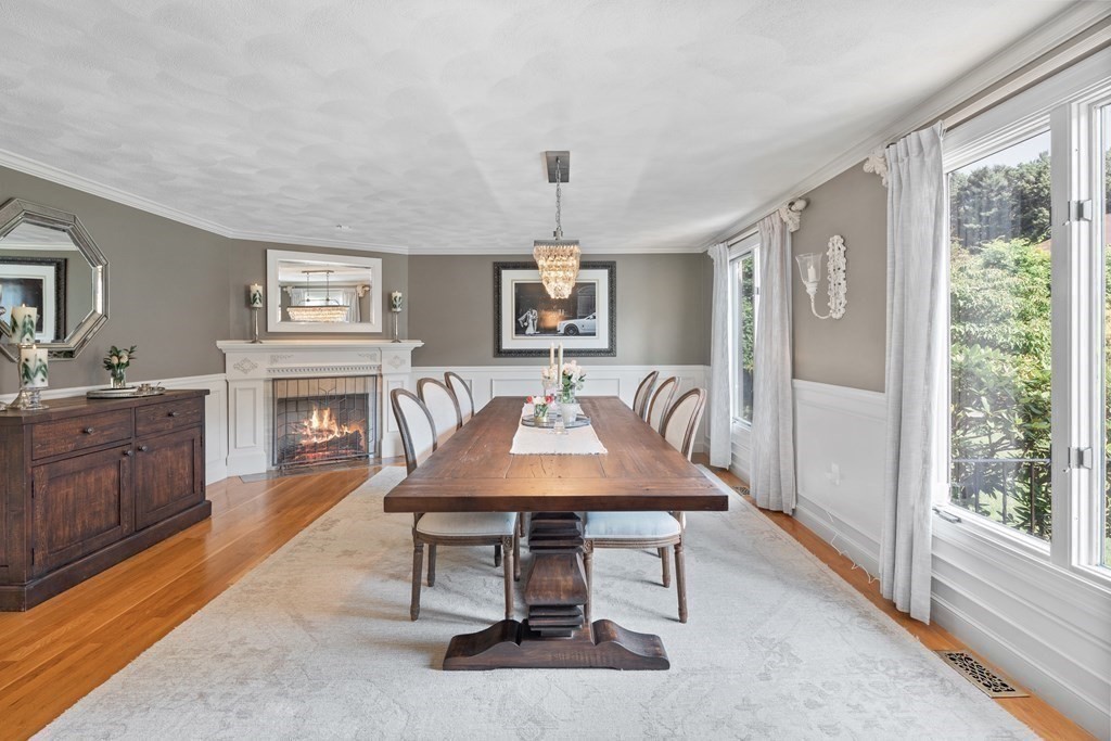 6 David Drive Andover, MA 01810 - Photo 6 of 41 a living room with furniture a large window and a fireplace