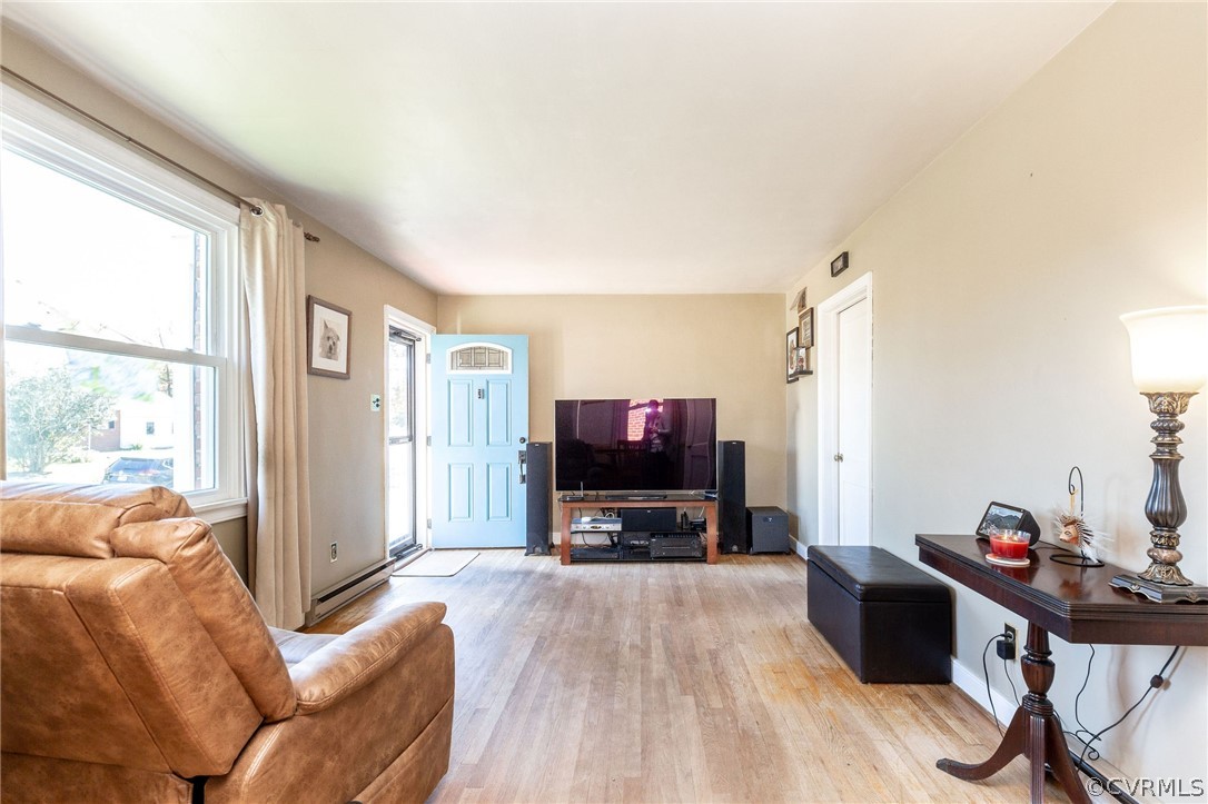 17 Medlock Road Sandston, VA 23150 - Photo 2 of 32 This is the living room area, that features Hardwo
