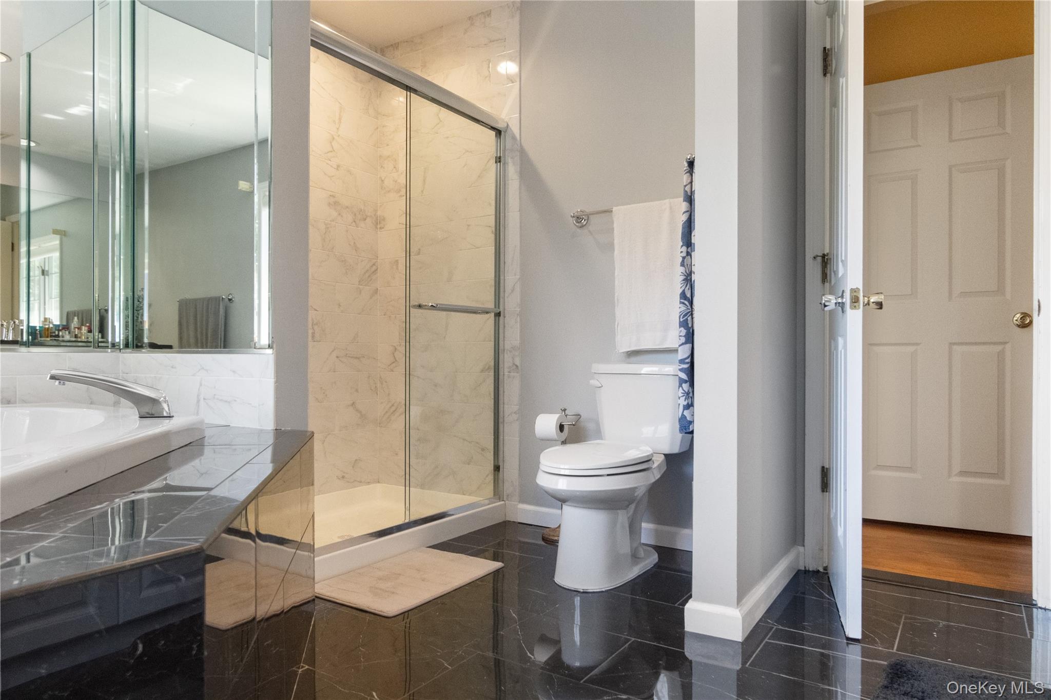 214 West Mombasha Road Monroe, NY 10950 - Photo 23 of 43 a bathroom with a sink toilet and shower