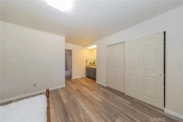 a view of a livingroom with wooden floor