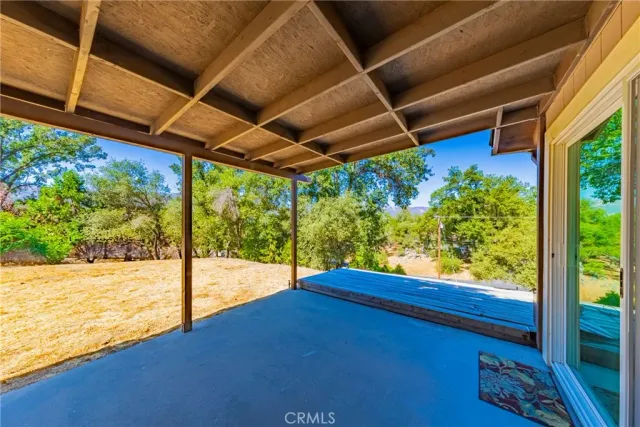 a view of a room with a large window