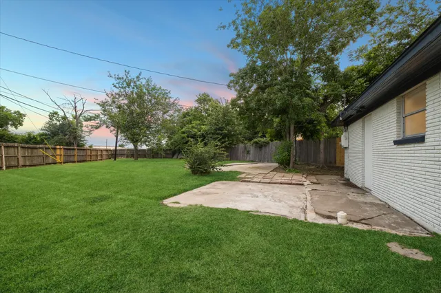 a view of a backyard with a garden