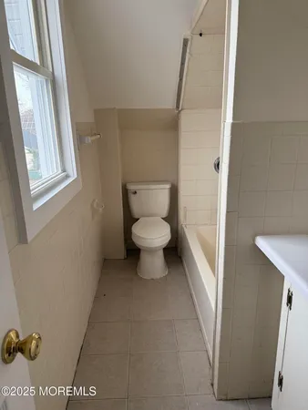 a bathroom with a toilet