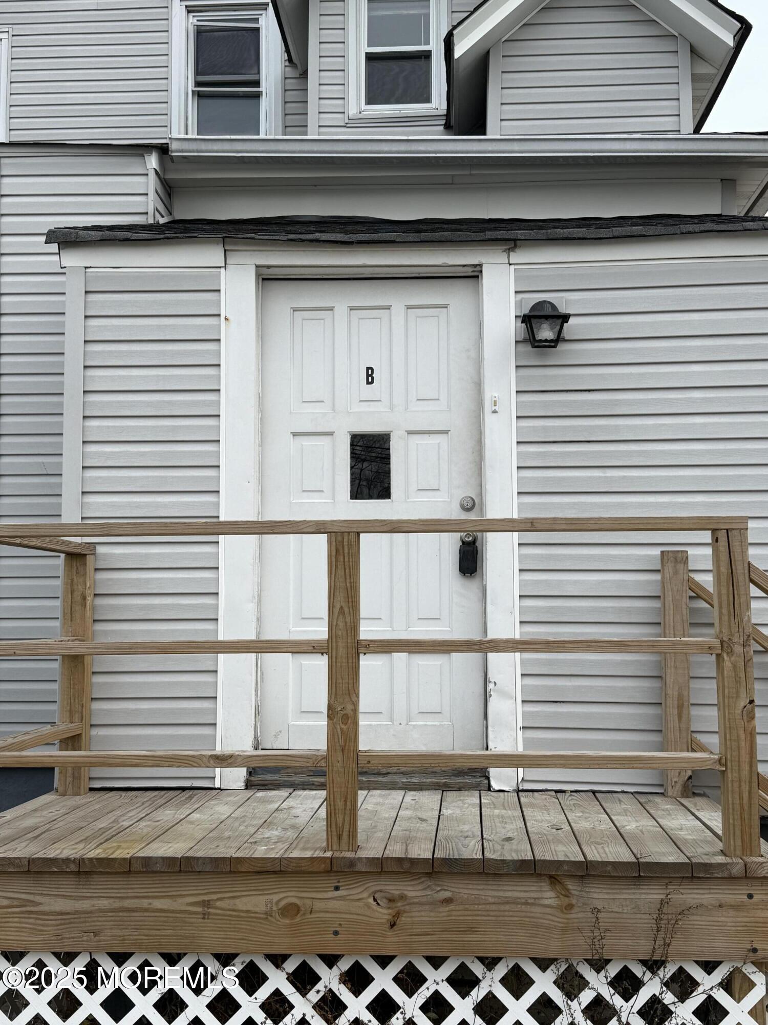 257 Carr Avenue, Unit B Keansburg, NJ 07734 - Photo 2 of 11 a black and white photo of a building