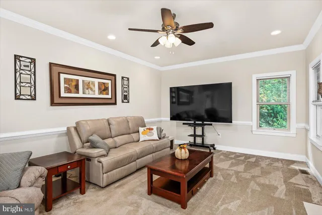 a spacious bedroom with a bed and a couch