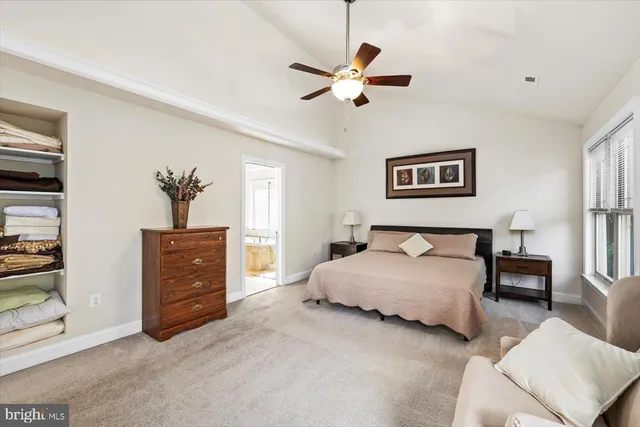 a bathroom with a tub a sink and a shower
