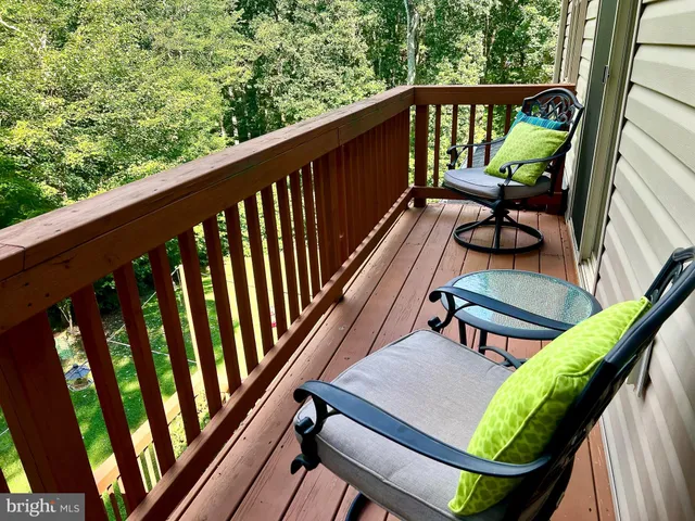 a living room with a couch and a flat screen tv