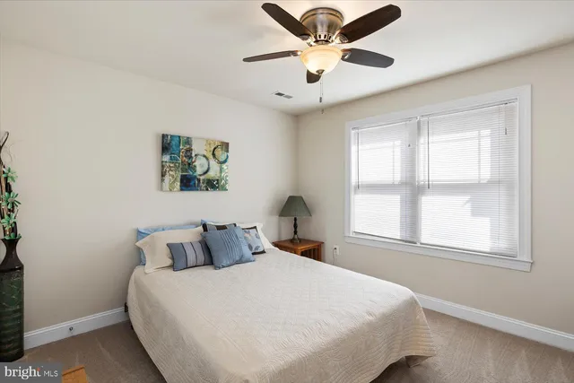 a room with furniture and gym equipment