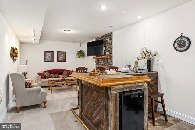 a view of balcony with furniture and wooden deck
