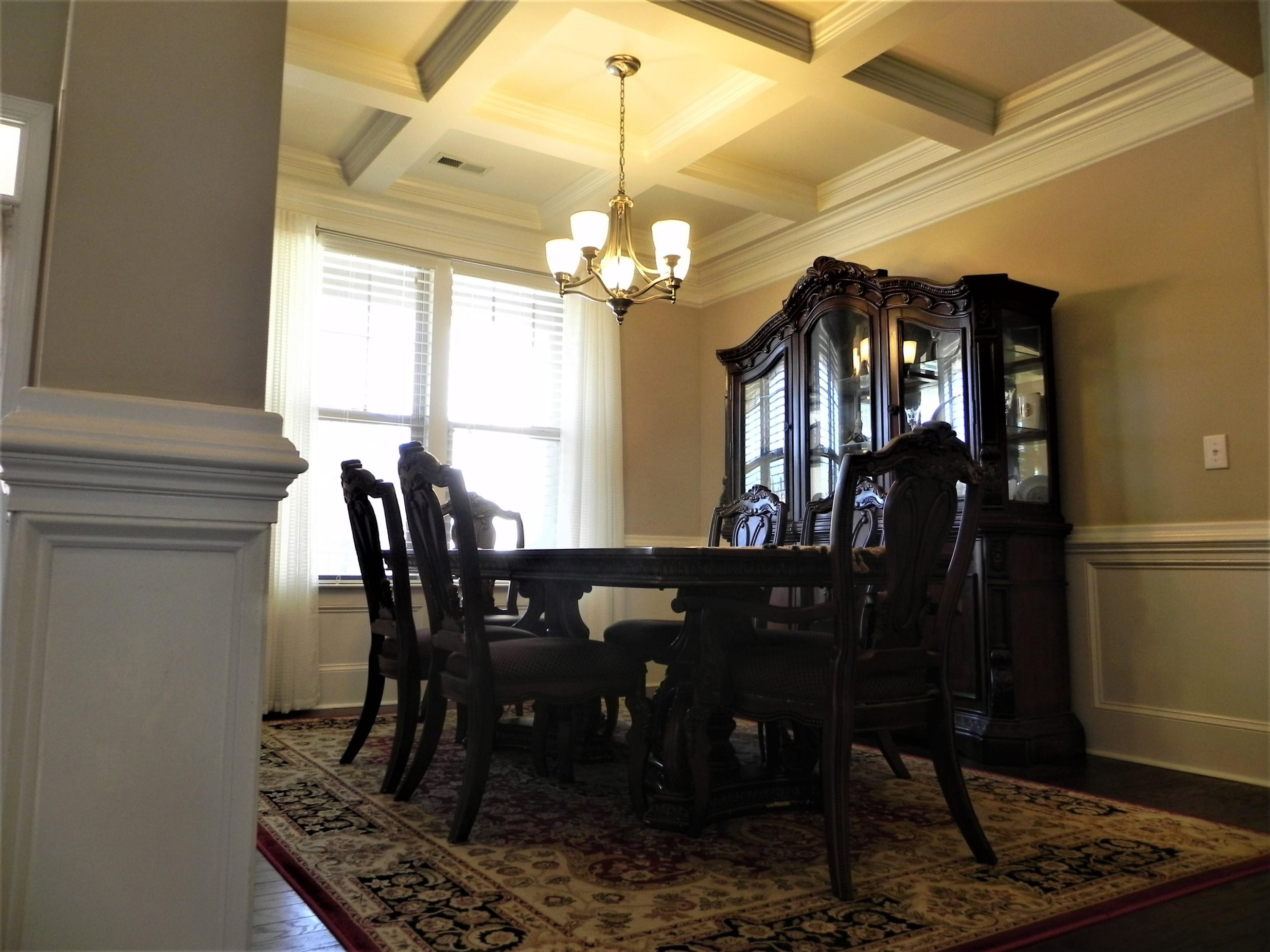 2129 Lower Lake Road Wake Forest, NC 27587 - Photo 9 of 41 Coffered Ceiling, Beautiful Trimwork and Large Window Make This Dining Area Great for Entertaining Dining Room