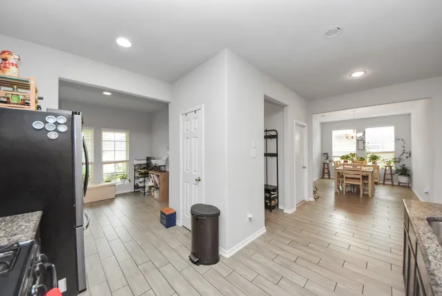 a view of a living room and dining room