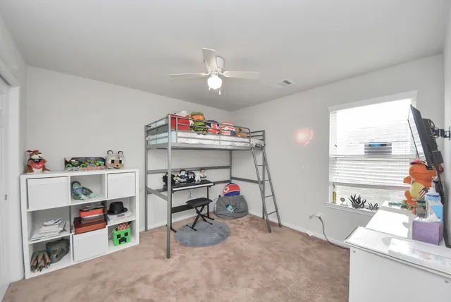 a storage & utility room with a window
