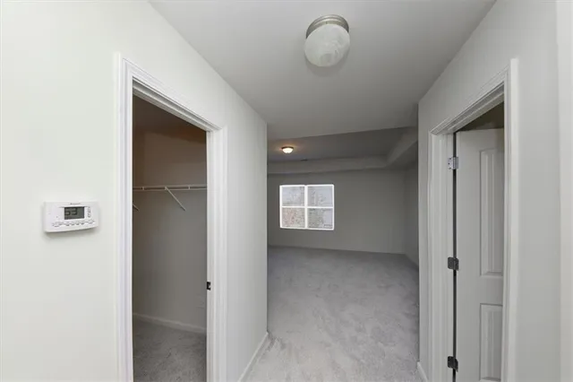 a view of empty room with windows