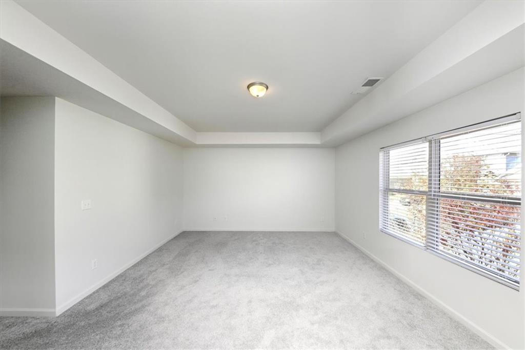 541 Tulip Lane McDonough, GA 30252 - Photo 21 of 32 an empty room with windows