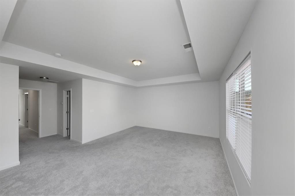 541 Tulip Lane McDonough, GA 30252 - Photo 22 of 32 an empty room with windows