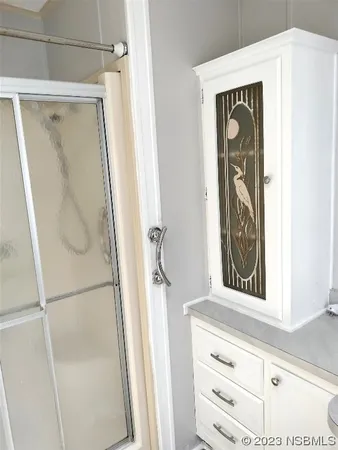 a bathroom with a mirror