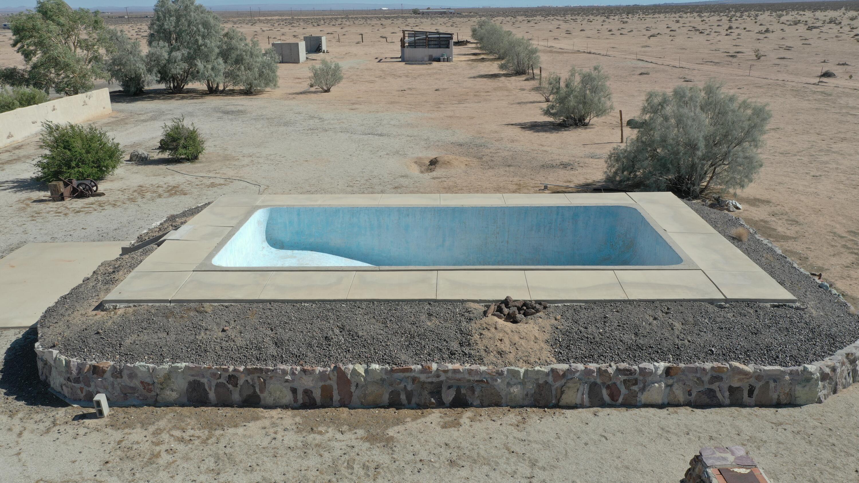 Castle Butte Road North Edwards, CA 93523 - Photo 13 of 22 a bathroom with a granite countertop sink and view of bathroom