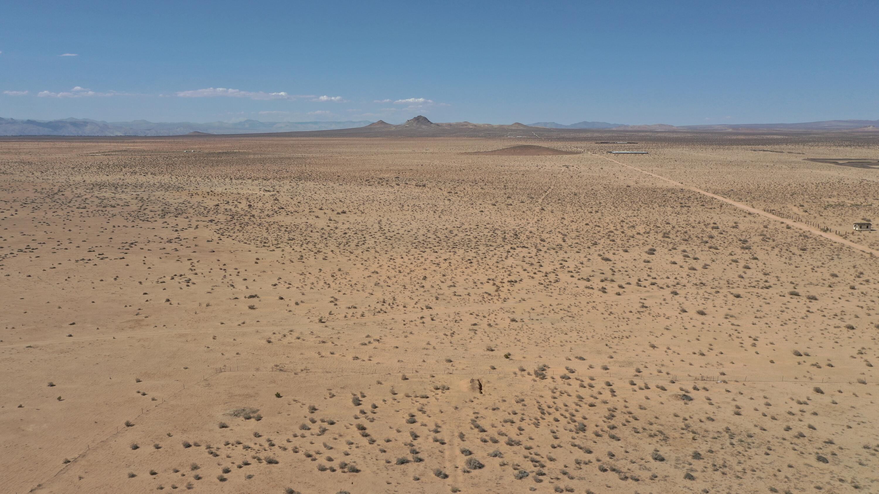 Castle Butte Road North Edwards, CA 93523 - Photo 22 of 22 a view of an ocean beach and mountain