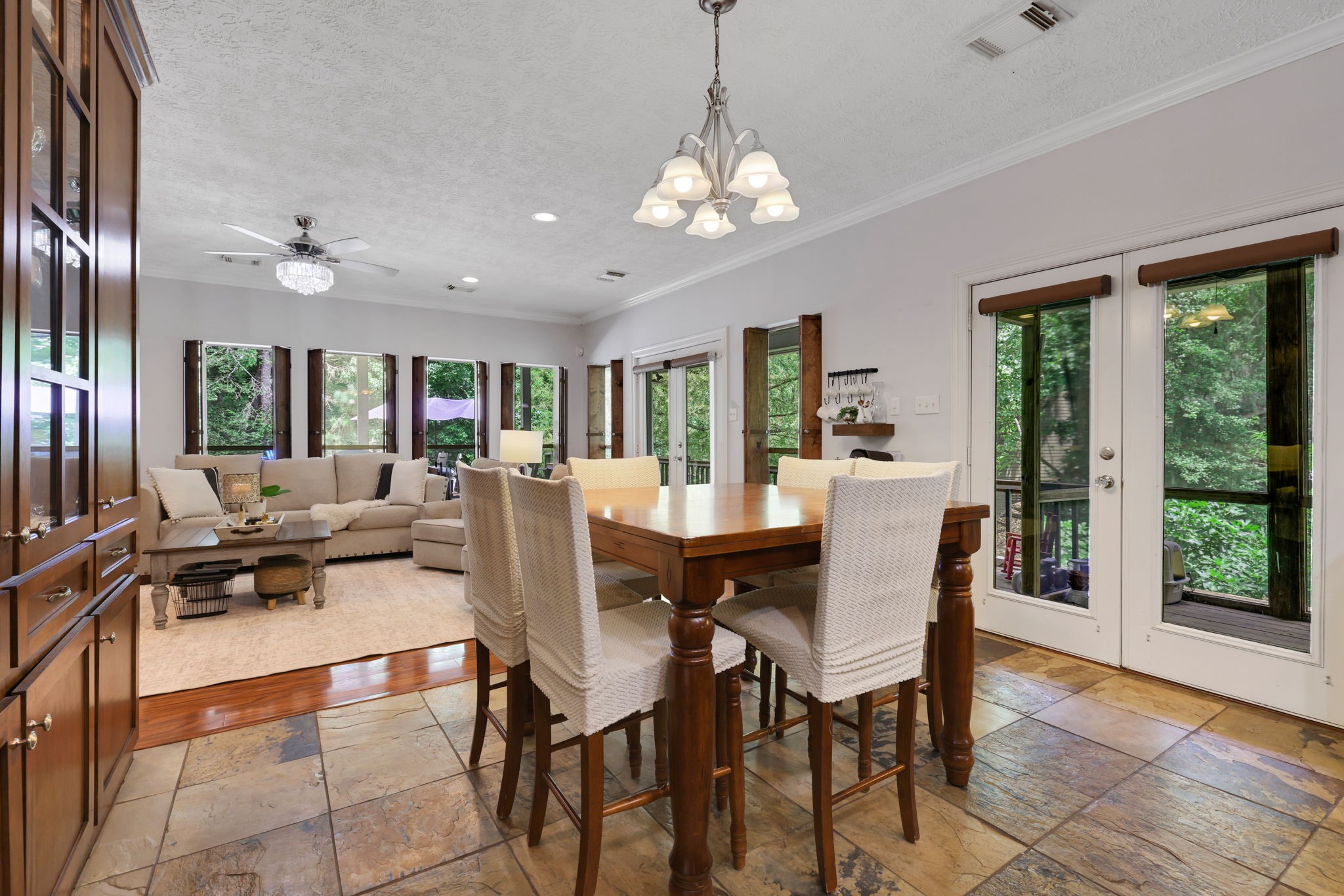 991 Kings Way Coldspring, TX 77331 - Photo 13 of 49 a view of a dining room with furniture window and outside view